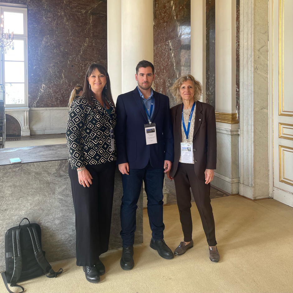 Pictured with Honorary Treasurer of EPS, Alessandra Fantoni, and President of EPS, Prof. Mairi Sakellariadou